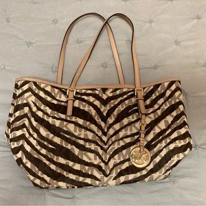 Micheal kors animal small tote bag. Gently used.